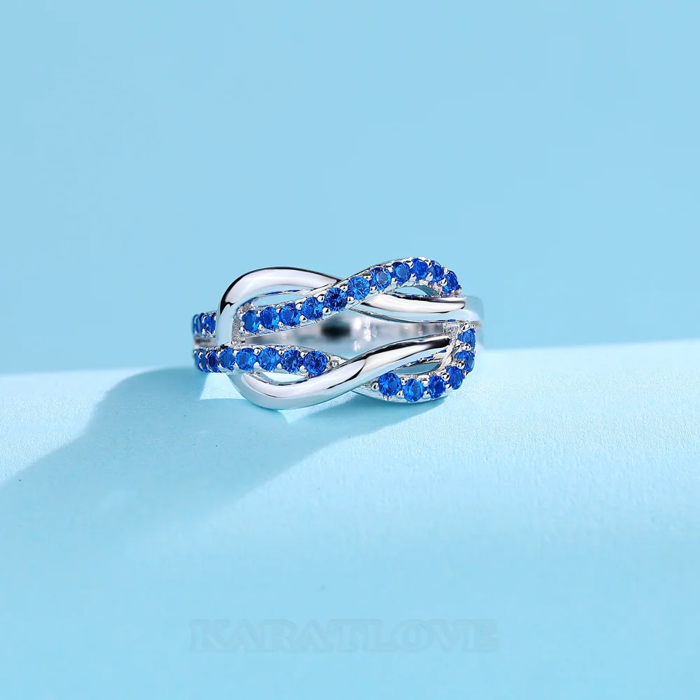 Bague de promesse en argent sterling et saphir bleu taille ronde