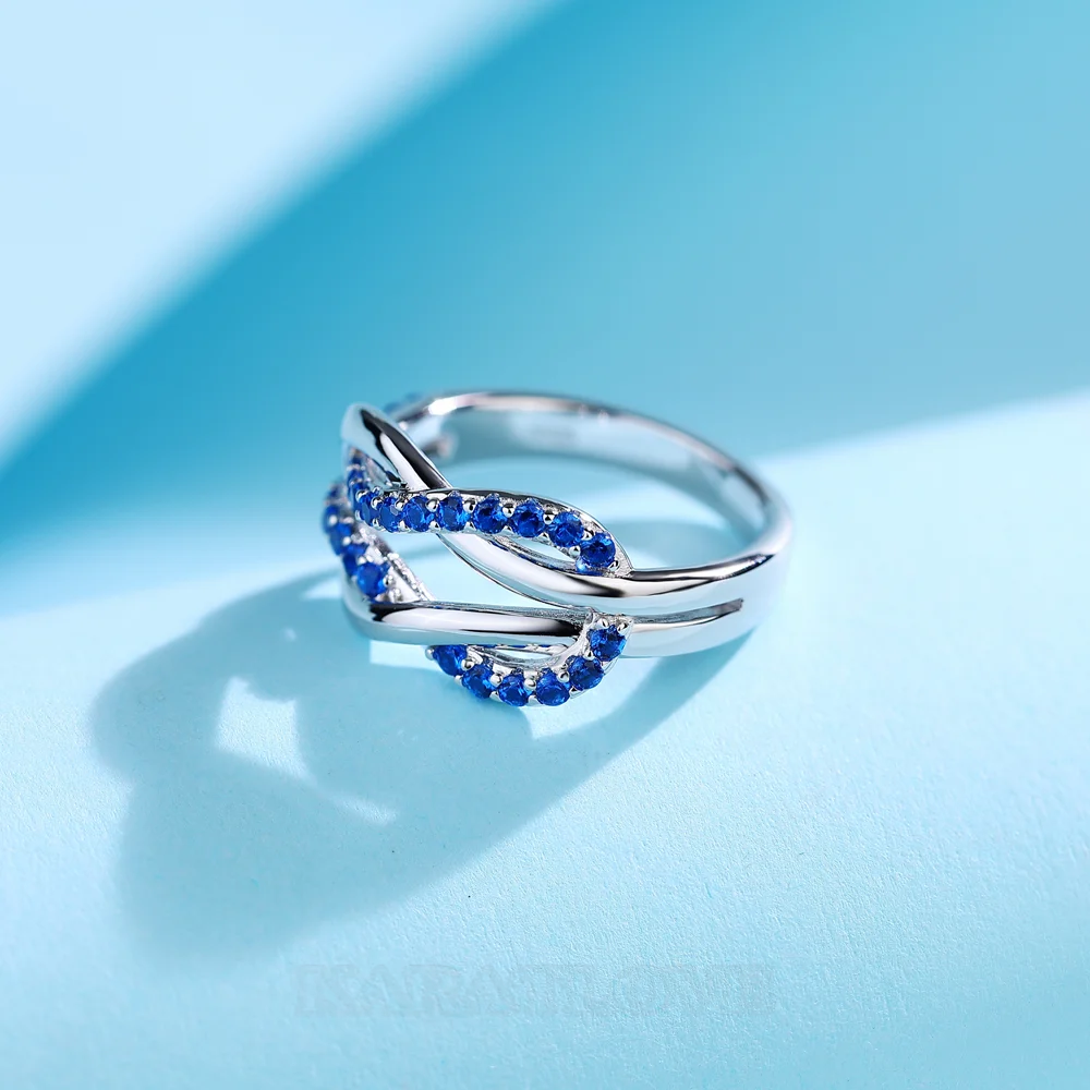 Bague de promesse en argent sterling et saphir bleu taille ronde