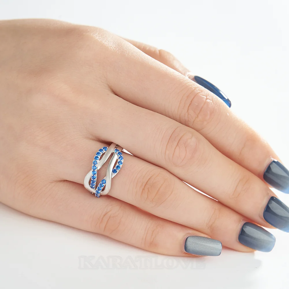 Bague de promesse en argent sterling et saphir bleu taille ronde