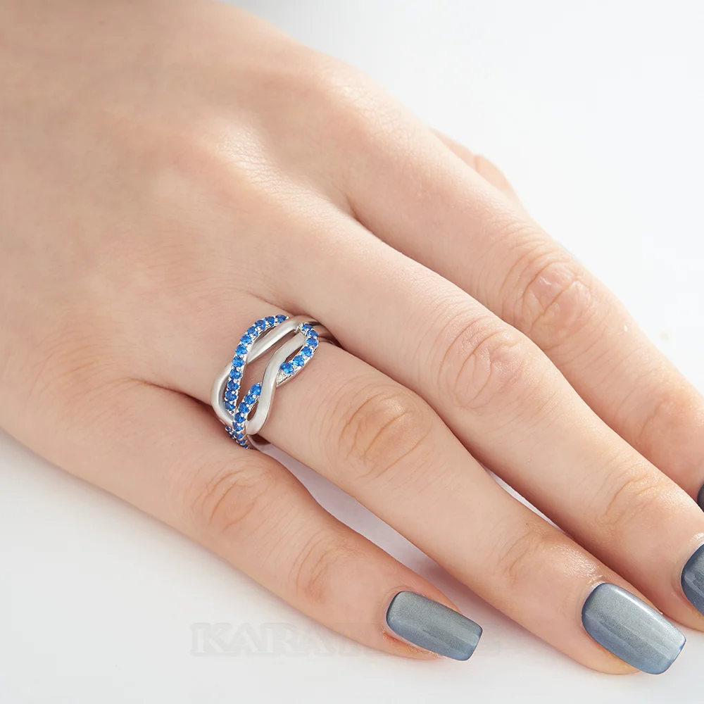 Bague de promesse en argent sterling et saphir bleu taille ronde