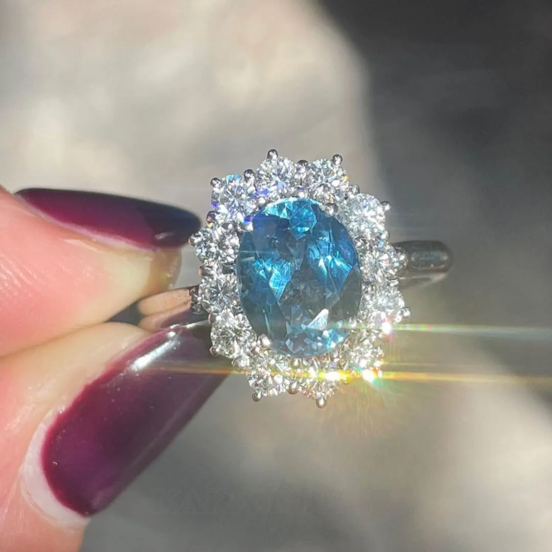 Bague de fiançailles en argent sterling avec halo d'aigue-marine de taille ovale