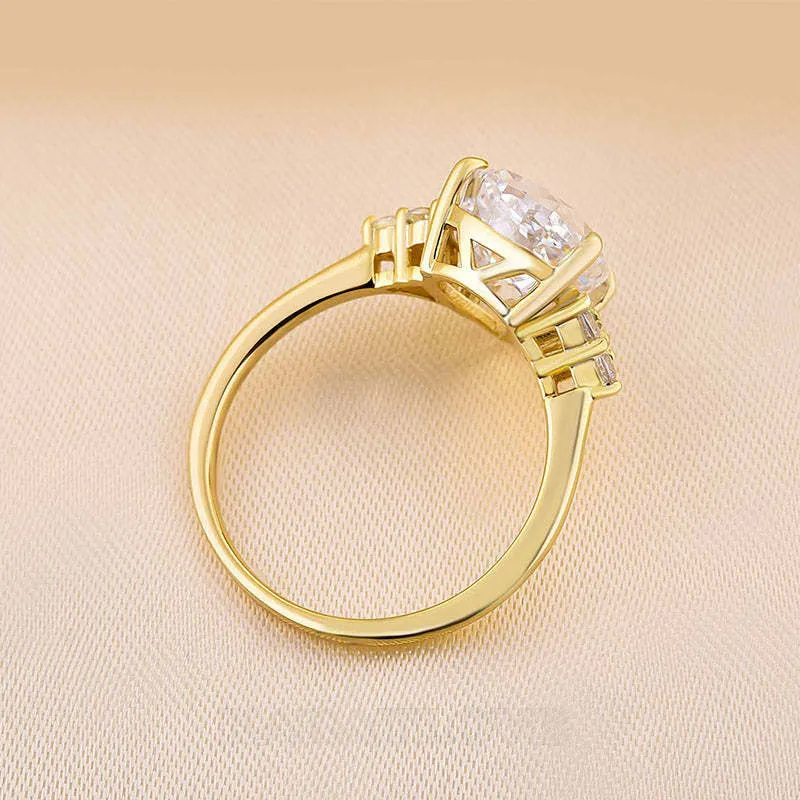 Bague de fiançailles 3 pierres en argent jaune et diamant poire blanc