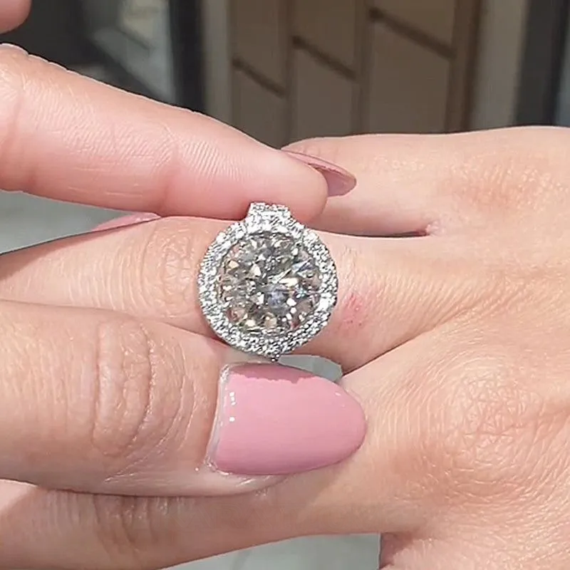 Bague de fiançailles en argent sterling avec halo en argent blanc et diamant rond