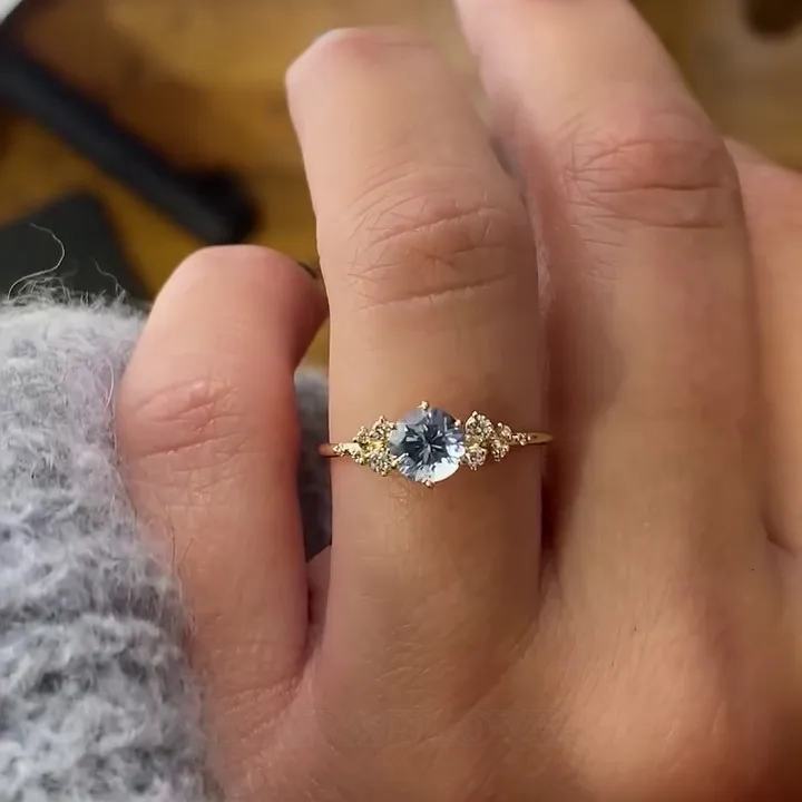Bague de fiançailles en argent jaune et or pour aigue-marine bleue à taille ronde
