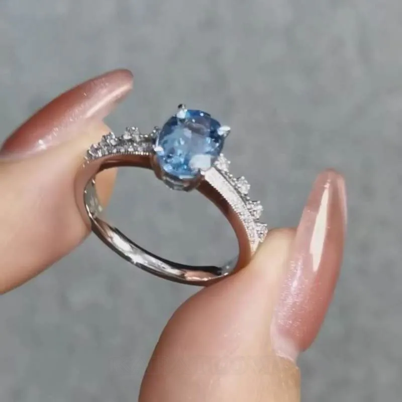 Bague de fiançailles en argent sterling avec aigue-marine bleue à taille ovale