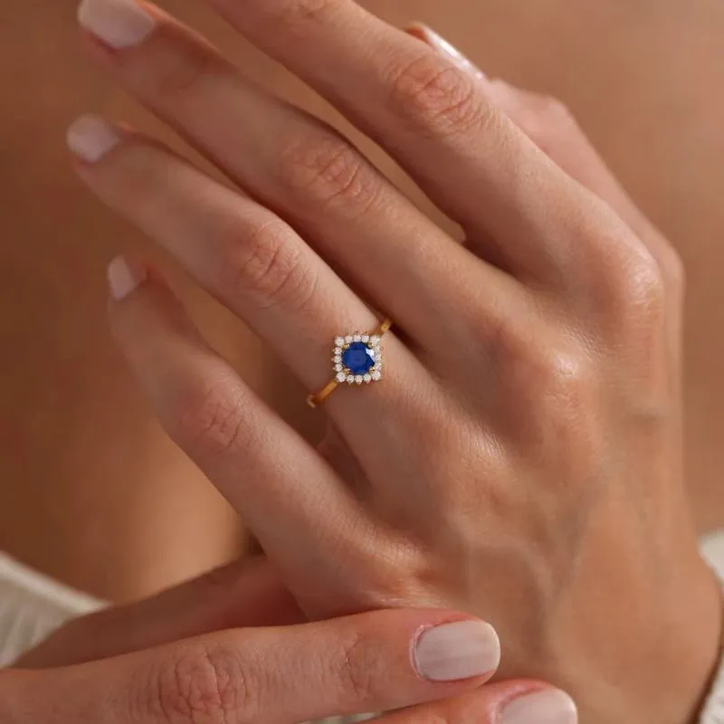 Bague de fiançailles halo en argent sterling et or jaune avec saphir bleu à taille ronde
