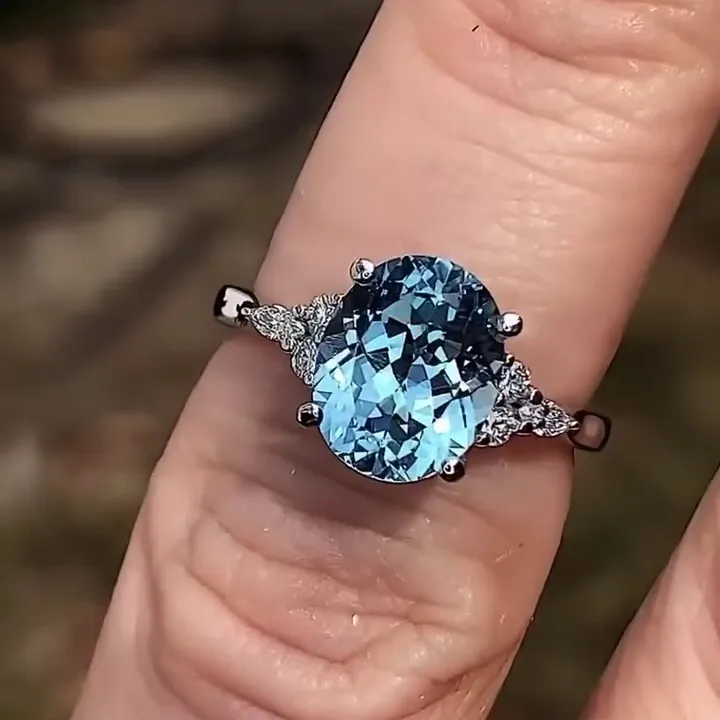 Bague de fiançailles en argent sterling avec aigue-marine bleue à taille ovale