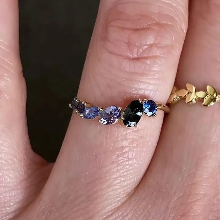 Bague de fiançailles en argent rose et saphir bleu à taille ovale