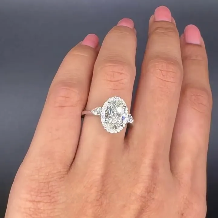Bague de fiançailles en argent sterling avec halo en diamant blanc de taille ovale