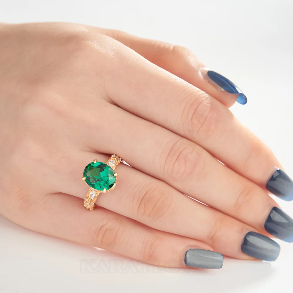 Bague de fiançailles en argent 925 et or jaune vert émeraude à taille ovale