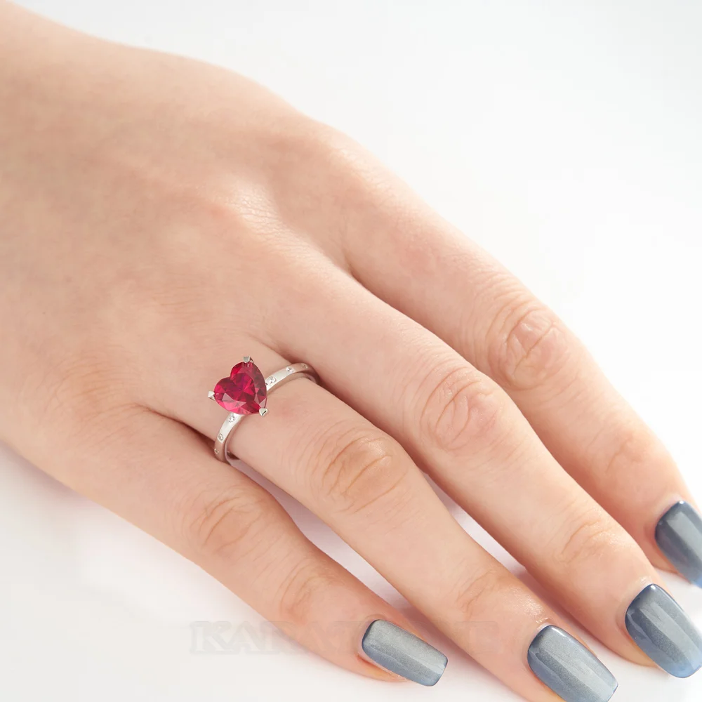 Bague de fiançailles en argent blanc avec diamant de taille cœur