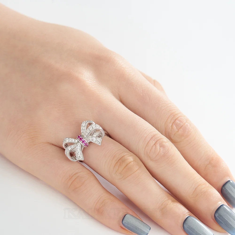 Bague pour femme en argent sterling rose à taille ronde avec nœud papillon