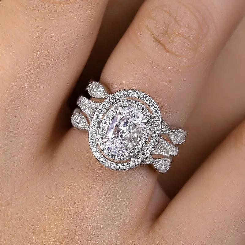 Bague à double halo en argent sterling blanc avec diamant de taille ovale
