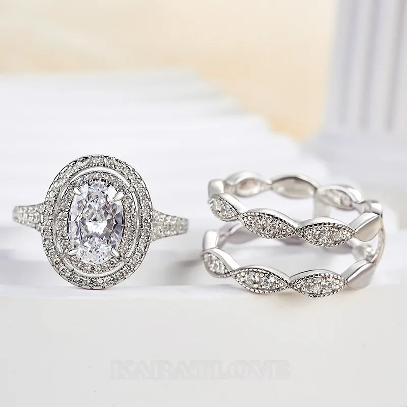 Bague à double halo en argent sterling blanc avec diamant de taille ovale