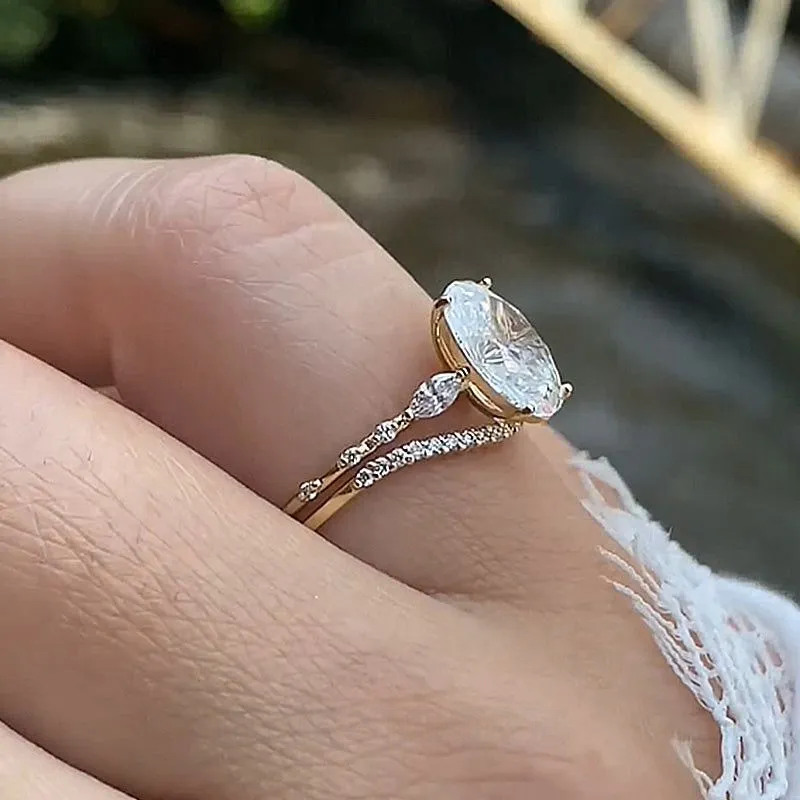 Bague 3 pierres en argent jaune et or blanc avec diamant ovale