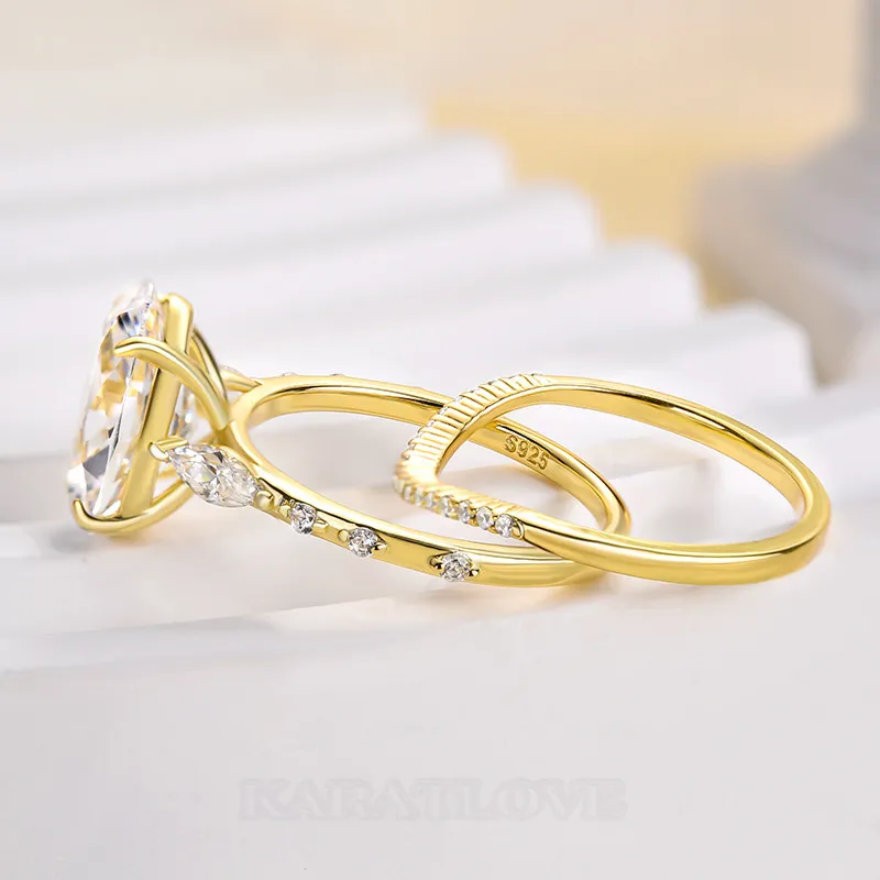 Bague 3 pierres en argent jaune et or blanc avec diamant ovale