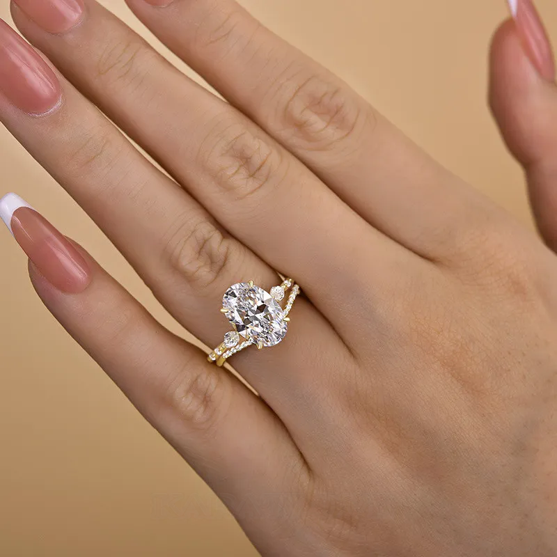 Bague 3 pierres en argent jaune et or blanc avec diamant ovale