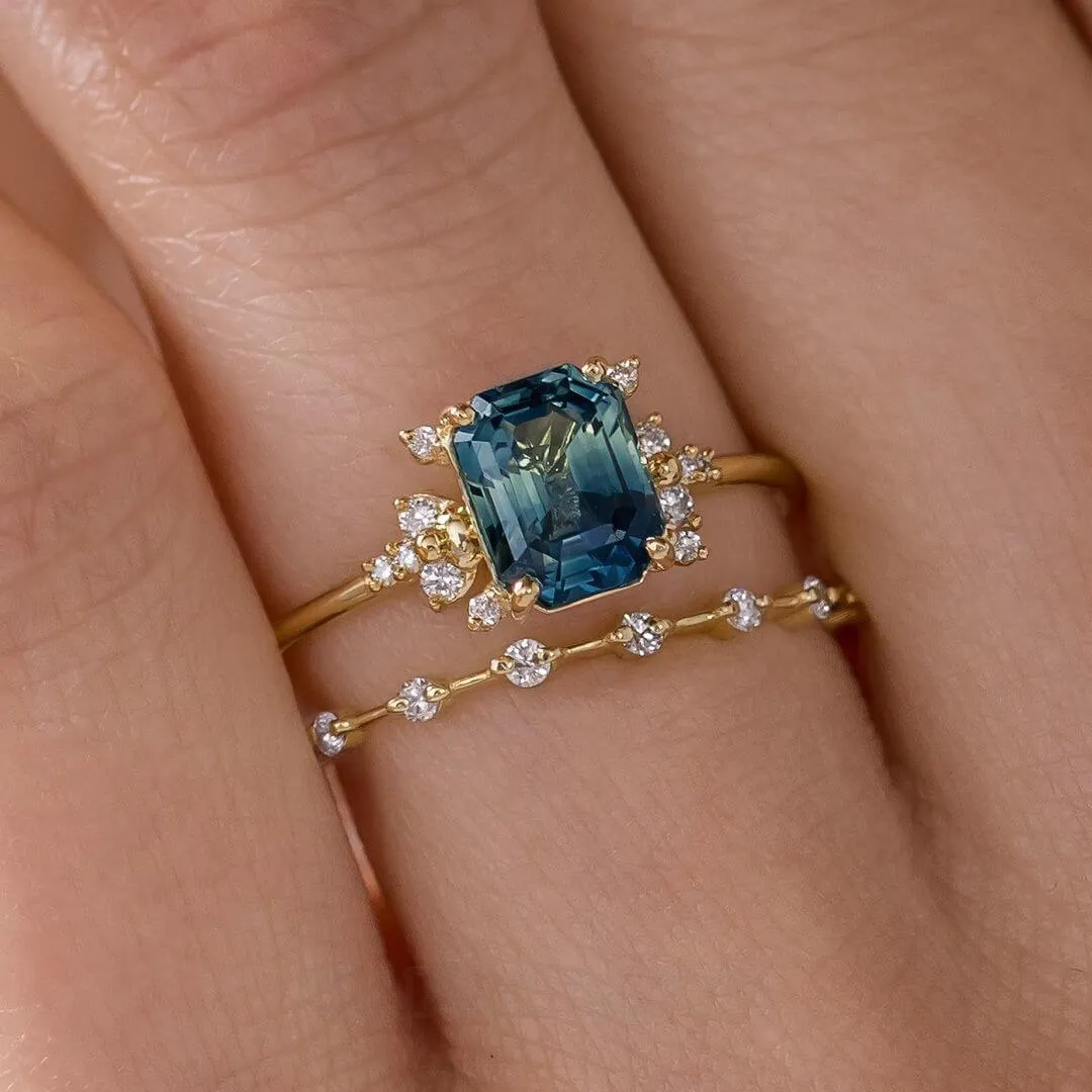 Emerald cut sapphire blue sterling silver yellow gold halo bridal sets