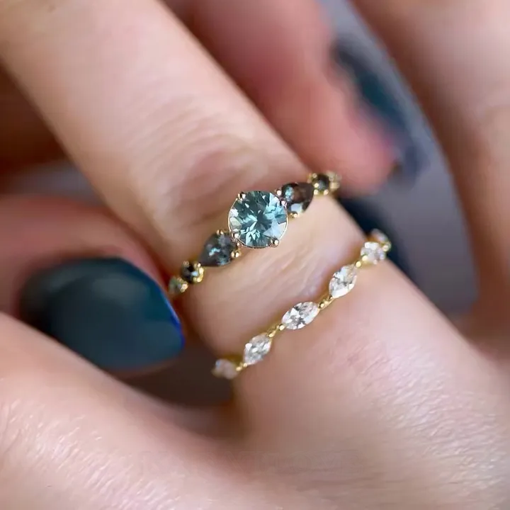 Set de mariage en argent jaune et or pour aigue-marine bleue à taille ronde