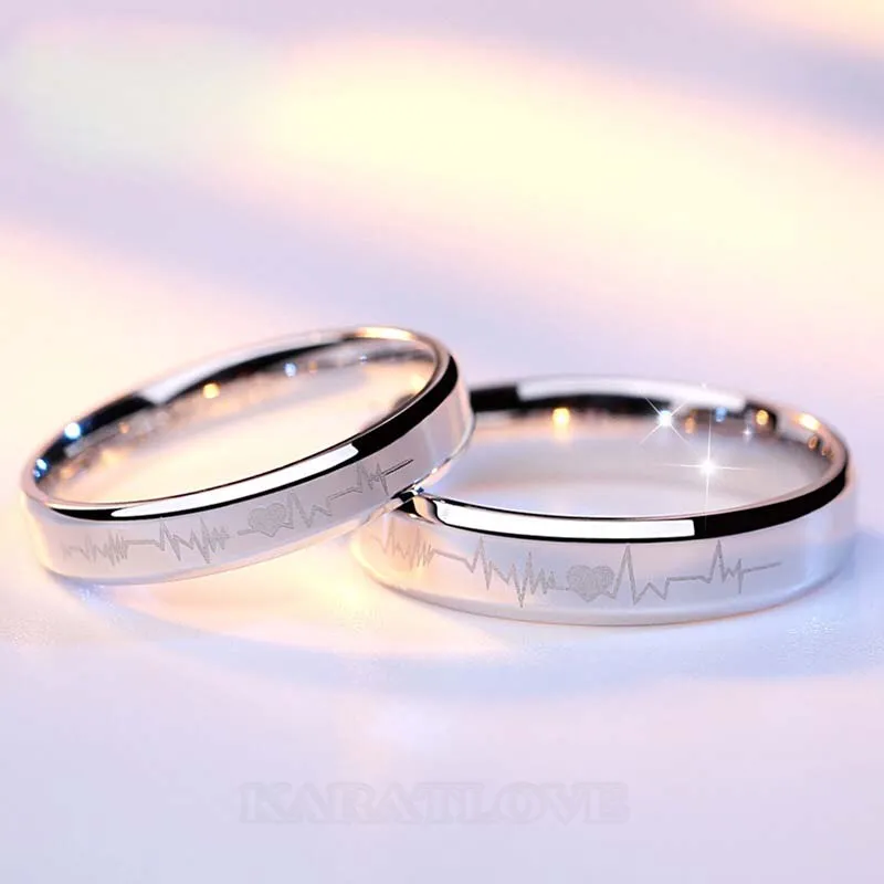 Bagues de couple en argent sterling avec battement de coeur