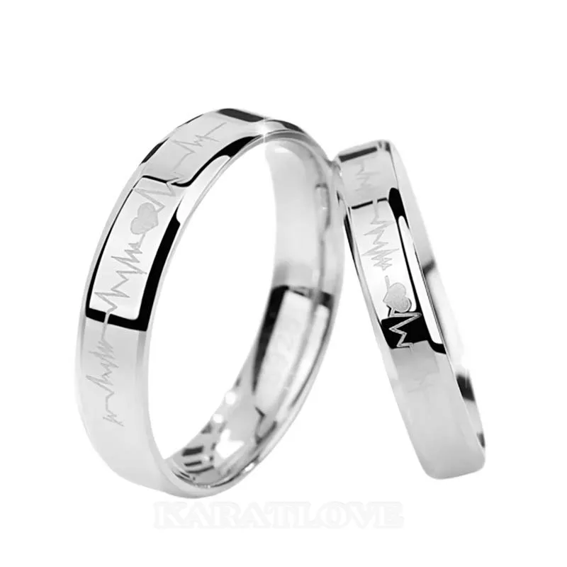 Bagues de couple en argent sterling avec battement de coeur