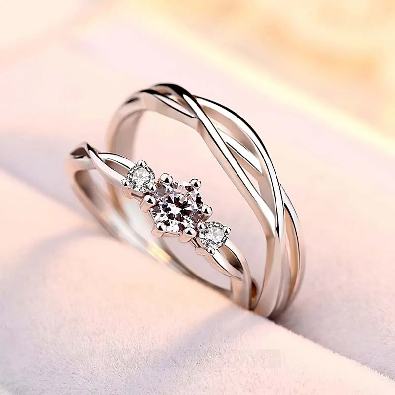 Anneaux de couple infinity en argent sterling avec diamant rond et blanc