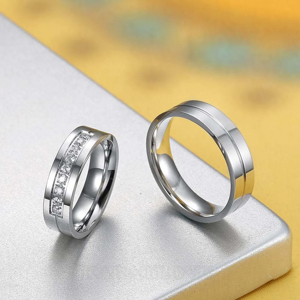 Bagues de couple en titane blanc à diamant rond