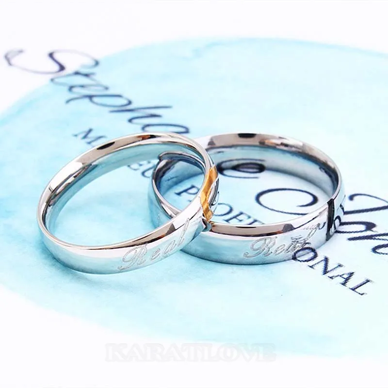 Anneaux de couple en titane avec cœur en or jaune