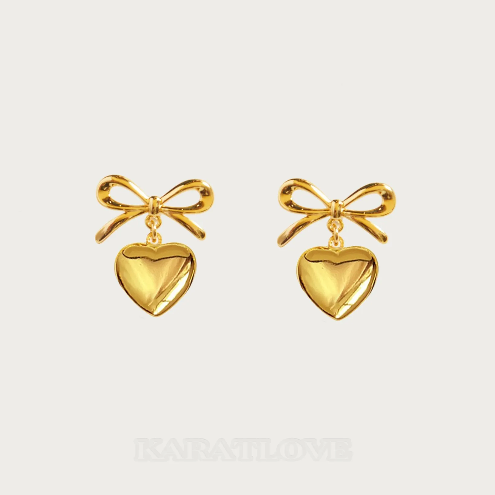 Boucles d'oreilles ruban en forme de cœur plaqué or 18k