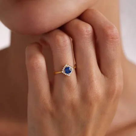 Bague de fiançailles halo en argent sterling et or jaune avec saphir bleu à taille ronde
