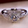 Bague de fiançailles art deco halo en argent 925 avec diamant rond et blanc