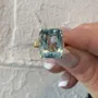Bague de fiançailles solitaire en argent jaune et or avec aigue-marine taillée en coussin