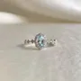 Bague de fiançailles en argent sterling avec halo d'aigue-marine de taille ovale