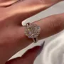 Bague de fiançailles en forme de halo en argent sterling et or rose, sertie d'un diamant ovale