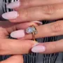 Bague de fiançailles en argent jaune or et diamant blanc de taille ovale