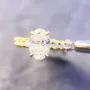 Bague de fiançailles en or jaune blanc et argent sterling avec diamant ovale