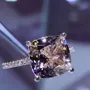 Bague de fiançailles à halo caché en argent rose 925 et champagne taille coussin