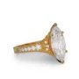 Bague de fiançailles en argent et or jaune avec diamant de taille marquise