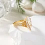 Bague de fiançailles en argent et or jaune avec diamant de taille marquise