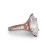 Bague de fiançailles en argent et or rose avec diamant de taille marquise