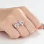 Bague pour femme en argent sterling rose à taille ronde avec nœud papillon