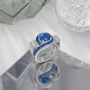 Bague de fiançailles Art Déco en argent sterling et saphir bleu taille ronde