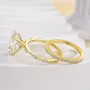 Bague en or jaune et argent blanc sertie d'un diamant ovale