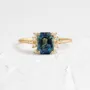 Emerald cut sapphire blue sterling silver yellow gold halo bridal sets