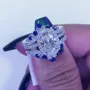 Anneau de mariage en argent sterling serti d'un halo en argent sterling et d'un saphir blanc à taille ovale