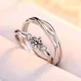 Anneaux de couple infinity en argent sterling avec diamant rond et blanc