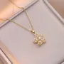 Collier à pendentifs en plaqué or 14k avec motif de fleur tourbillonnante